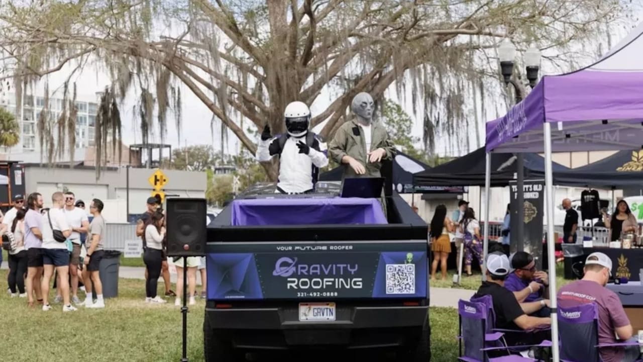 Gravity Roofing's Gravitron and alien mascot entertaining guests at Brunch in the Park 2025 in Orlando, Florida