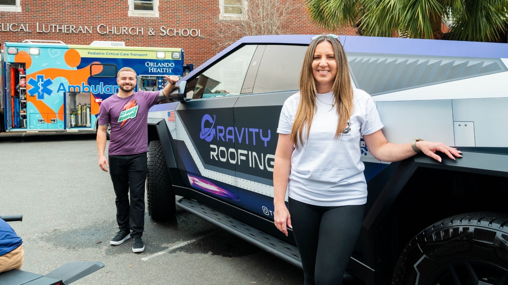 Gravity Roofing team with their Gravitron truck at Touch-A-Truck 2025 at Trinity Downtown Lutheran Church and Child Development Center in Orlando, Florida